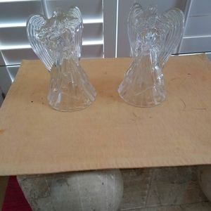 A Pair Of 24% Lead Crystal Angel Candle Holders